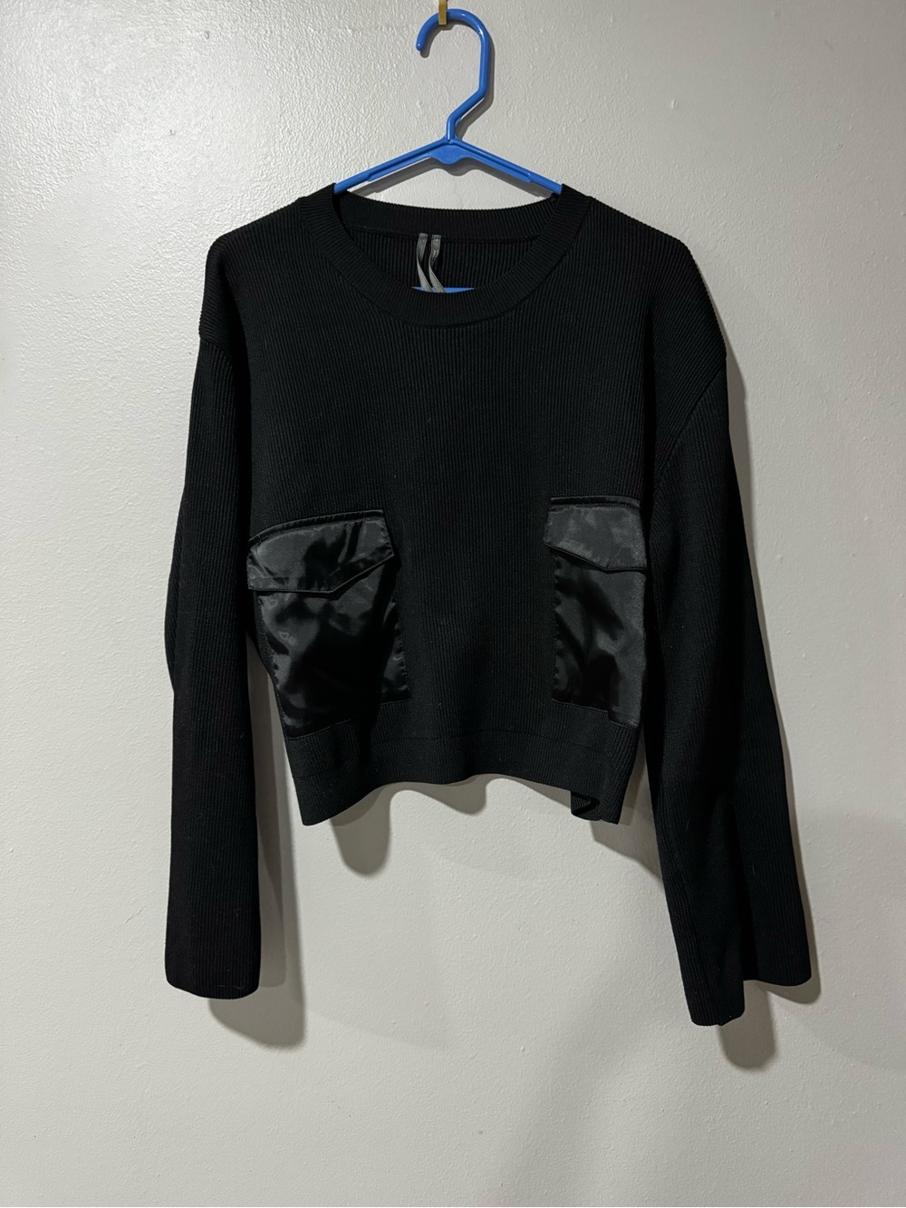 Anthropologie Black Cropped Crewneck Sweater with Satin Patch Pockets